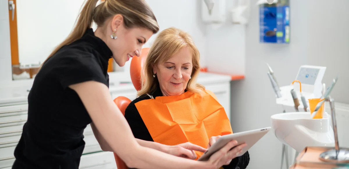 Patient consulting with dentist in a modern Budapest dental clinic
